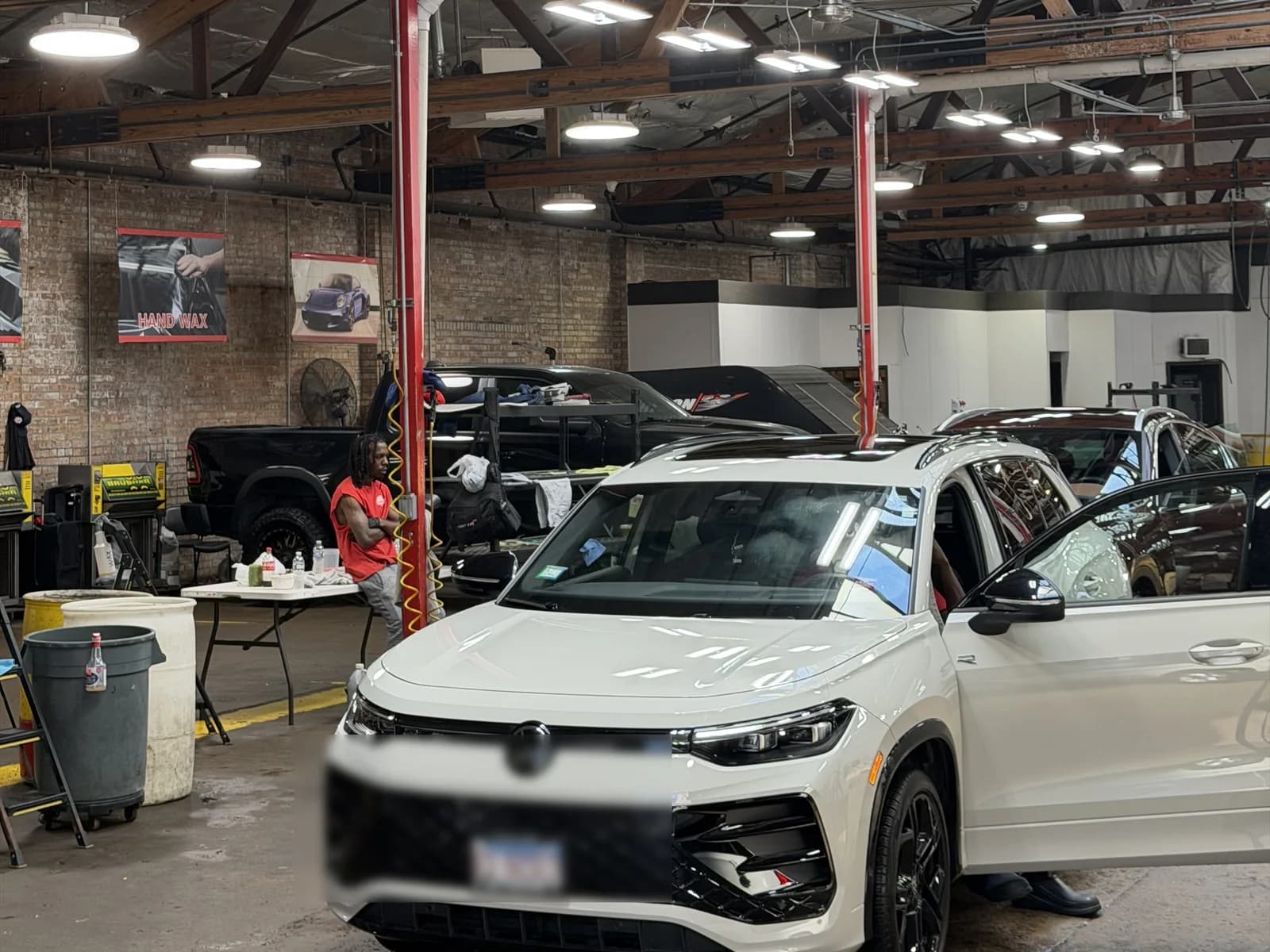 Finished vehicle with clean, glossy paintwork inside the South Loop wash bay
