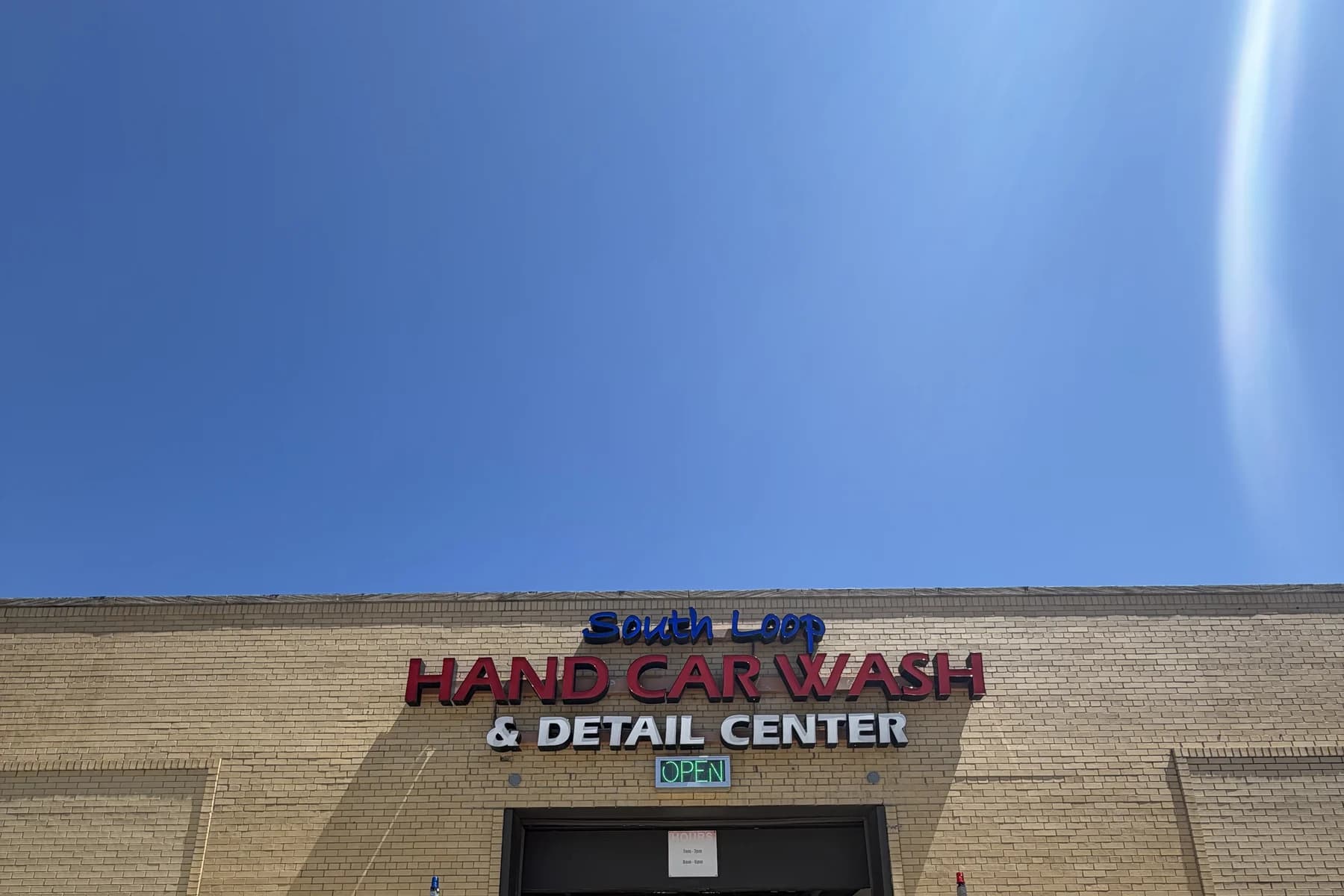 South Loop Hand Car Wash & Detail Center storefront signage